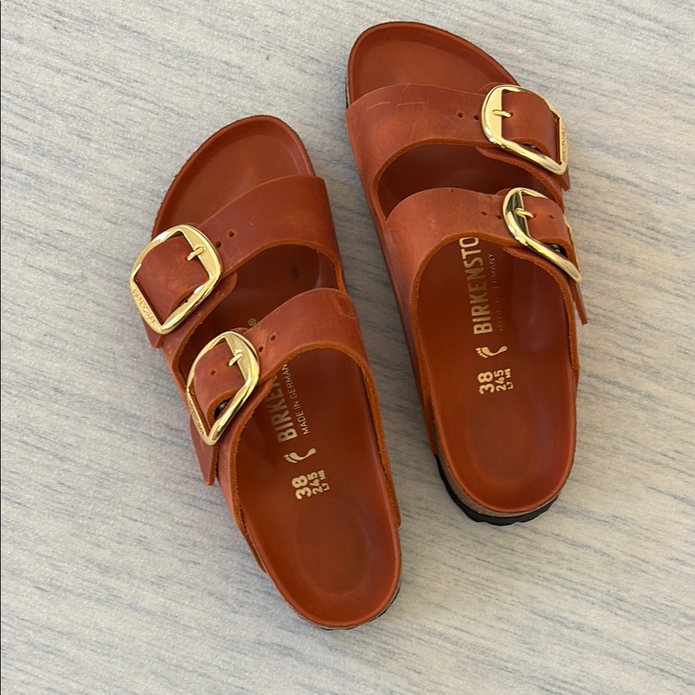 Birkenstock Orange Sandals with Gold Buckles